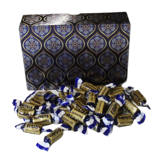 Pots of Sweets sugar-free chocolate eclairs in gold wrappers with blue ends, displayed with a decorative paisley box.